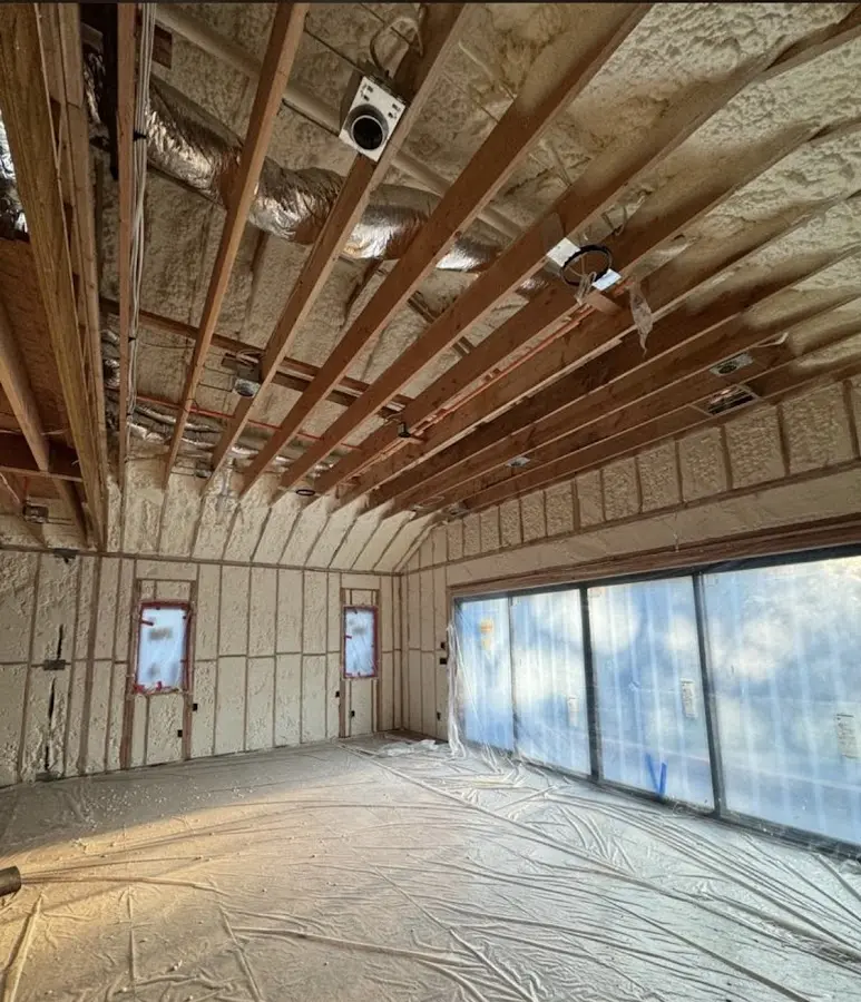 Interior walls and ceiling insulated with spray foam during new construction in Fort Pierce North